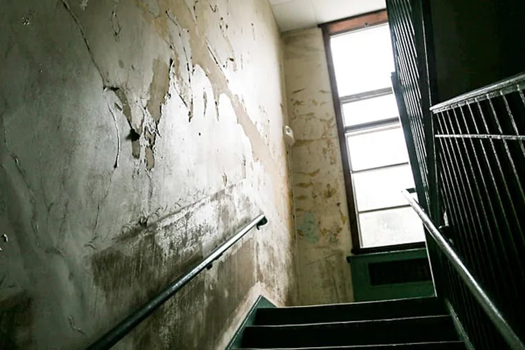 Stairwell at Edwards School. The school's namesake, Elizabeth V. Edwards, is said to haunt the building. (Andrew Thayer/Staff Photographer)