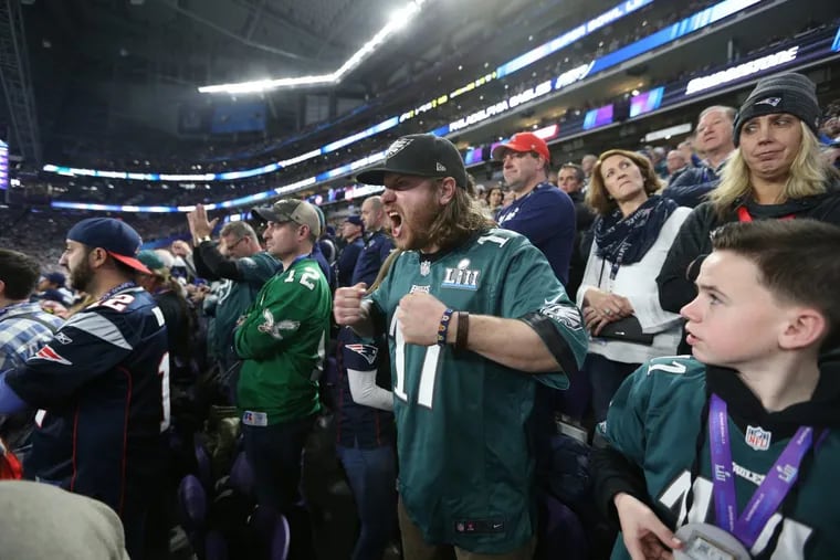 Harrison Buck, reacts as the Eagles defeat the Patriots in Super Bowl LII, at U.S. Bank Stadium.