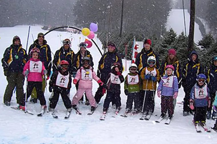 A group of participants with the Woods Valley Children's Program at Woods Valley in Westernville, N.Y. It's important to get children ski lessons before hitting the slopes.  (AP Photo/Woods Valley)