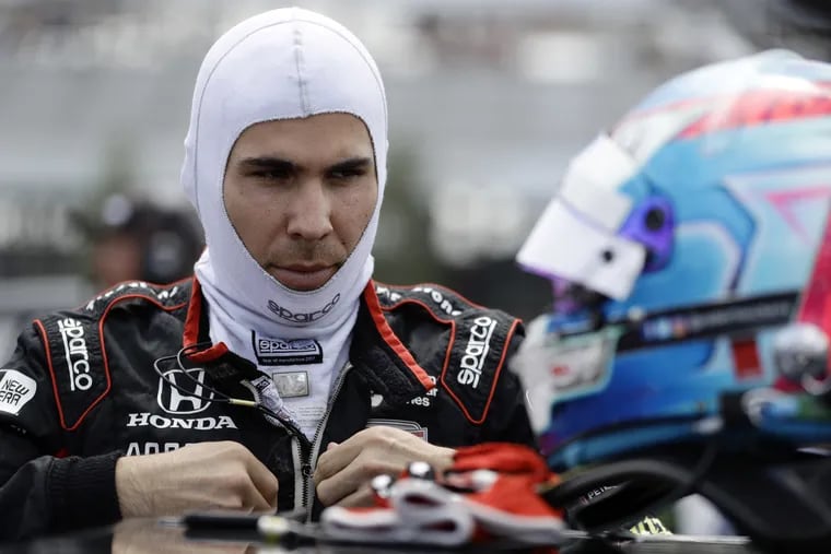 Robert Wickens prepares to qualify for Sunday's IndyCar series auto race, Saturday, Aug. 18, 2018, in Long Pond, Pa. (AP Photo/Matt Slocum)