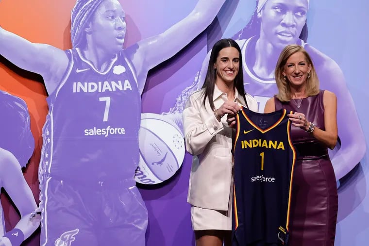 Iowa's Caitlin Clark (left) with WNBA commissioner Cathy Engelbert after being selected first overall by the Indiana Fever on April 15.