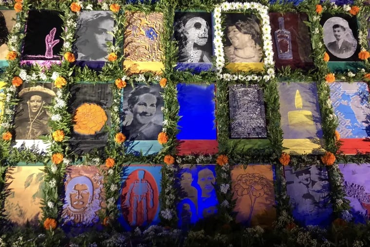 Portraits and artwork of local artist Ana Guissel Palma were the centerpiece of the altar created for South Philly's Day of the Dead procession, that ended at Fleisher Art Memorial. Oct. 28, 2018.