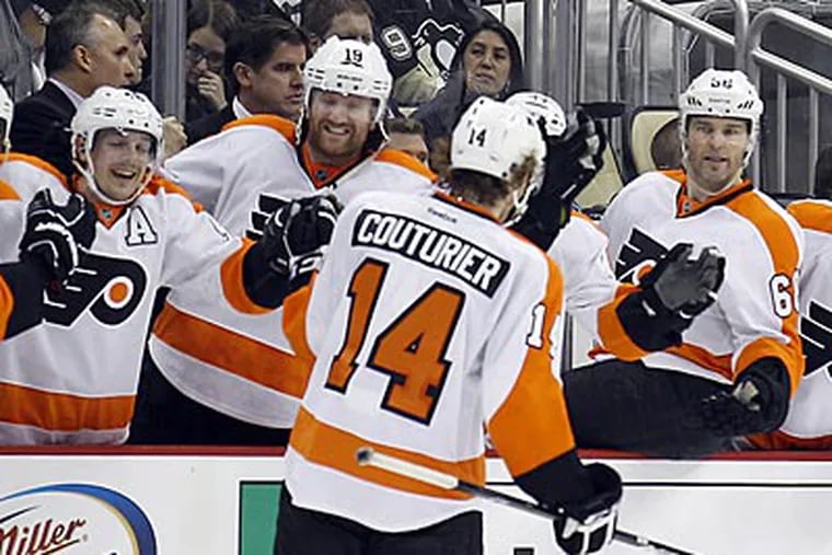 Sean Couturier scored his first career hat trick in the Flyers' 8-5 win against the Penguins. (Yong Kim/Staff Photographer)