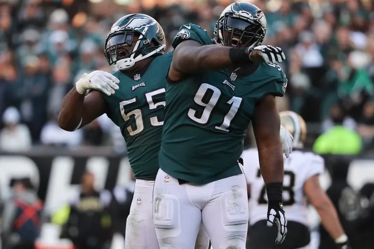 Eagles defensive linemen Brandon Graham (left) and Fletcher Cox have been teammates since 2012. "I feel like me and B.G. been married for 11 years," Cox said last season.