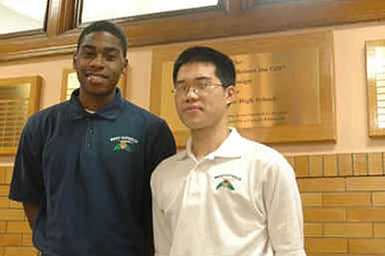 Patrick Osuagwu (left) and Jichang Ni, classmates since the third grade, are among six high school graduates in the state who have been named Gates Millennium Scholars, an award that covers all college costs.
