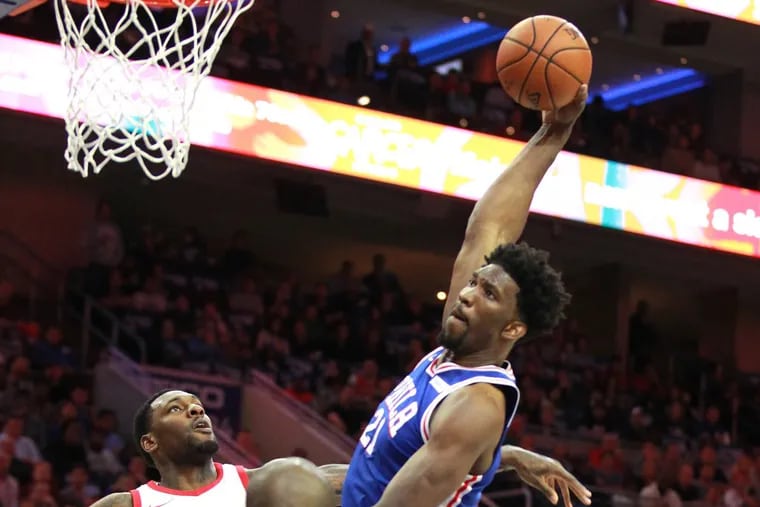 Sixers center Joel Embiid goes up for a dunk in the Sixers 105-104 loss to the Rockets.