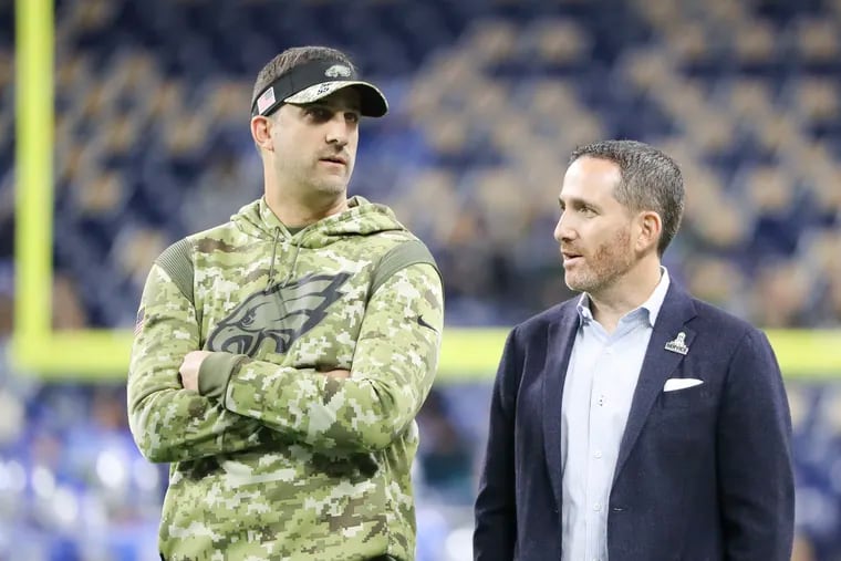 Eagles coach Nick Sirianni discusses, perhaps, the fertilization of this year's crop of Eagles with GM Howie Roseman (right) in Detroit.