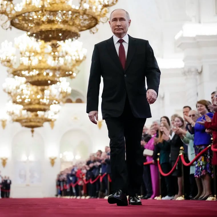 Vladimir Putin walks to take his oath as Russian president during an inauguration ceremony in the Grand Kremlin Palace in Moscow on Tuesday.