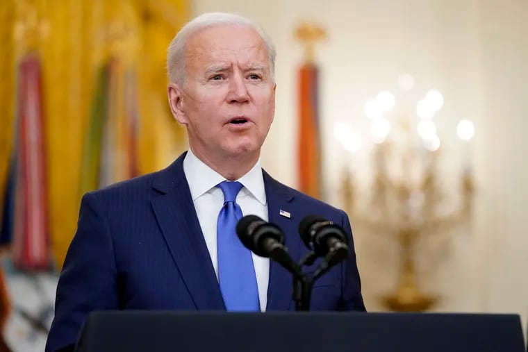 President Joe Biden speaks during an event to mark International Women's Day on March 8 in the East Room of the White House in Washington.