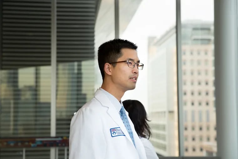 Jason Han, shown at the Perelman Center for Advanced Medicine as a medical student, is now a surgical resident at Penn.