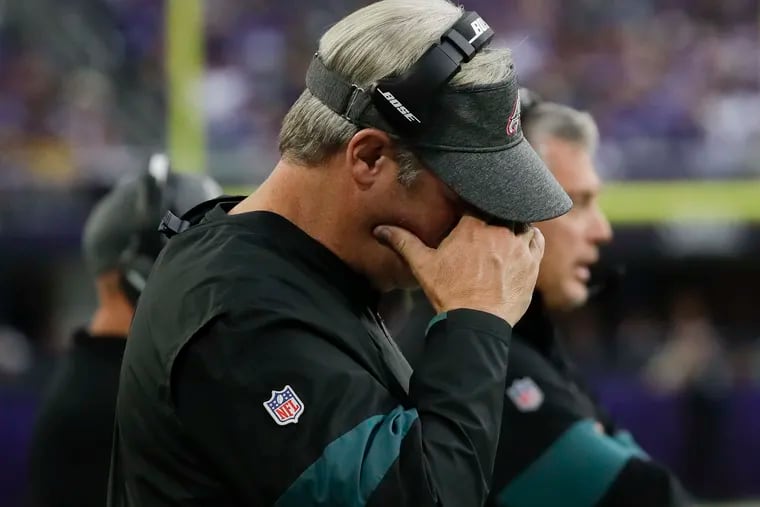 Eagles Head Coach Doug Pederson wipes his face late in the game against the Minnesota Vikings on Sunday, October 13, 2019 in Minneapolis.  The Viking beat the Eagles 38-20.