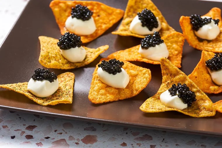 Caviar-topped Doritos. MUST CREDIT: Photo for The Washington Post by Rey Lopez