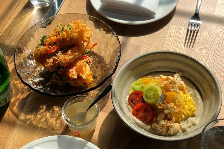 Dishes at Sarvida in Fishtown: At left is ukoy with Sukang paombong (sweet potato and shrimp fritter, Thai chili-garlic palm vinegar). At right is tortang talong (eggplant omelette) with local tomatoes and house-made salted egg.