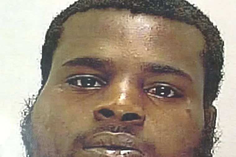 Malik Macklin after his arrest by Camden County police in 2013. A police sergeant said Macklin charged him. Jurors were skeptical.