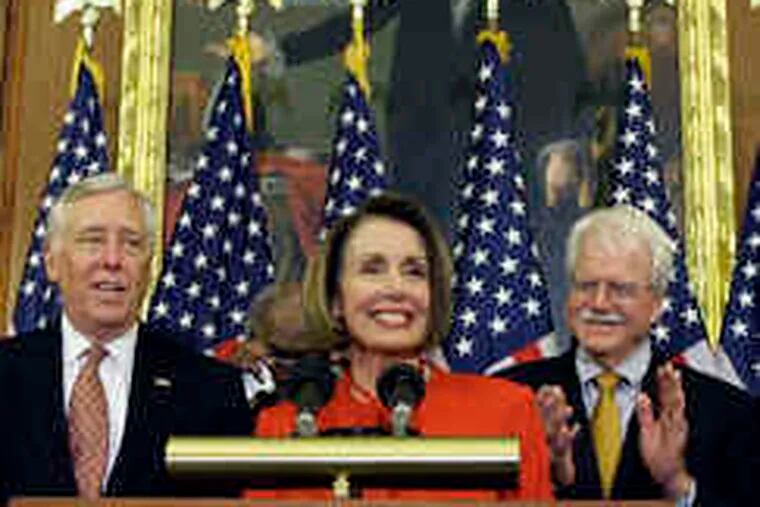 Speaker Nancy Pelosi , with Majority Leader Steny H. Hoyer (left) and Rep. George Miller, after the House's vote.