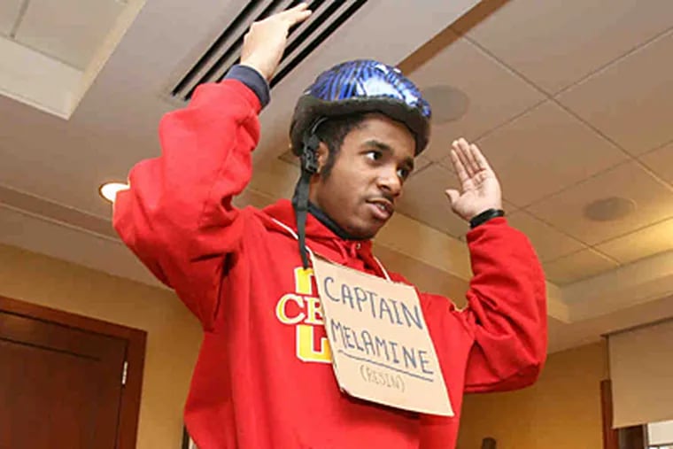 Ali Miller, a science student at Central High School, dresses up as his favorite plastic in Schuyler Patton's material science class. The annual Polymer Pageant is part of the learning. (Charles Fox/Staff)