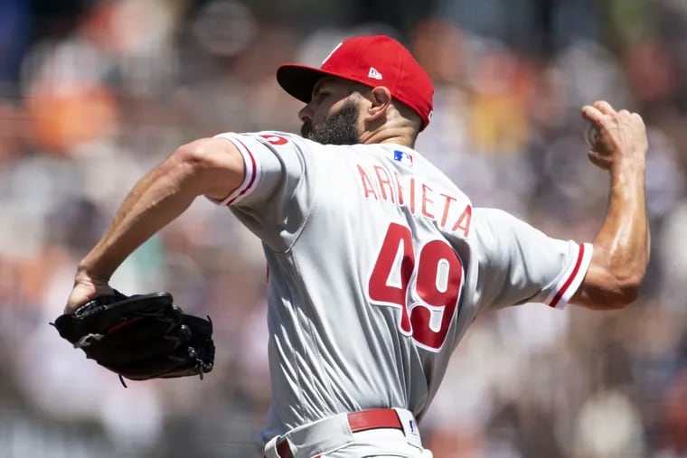 Philadelphia Phillies starting pitcher Jake Arrieta (49) delivers against the San Francisco Giants during the second inning of a baseball game, Sunday, June 3, 2018, in San Francisco. 