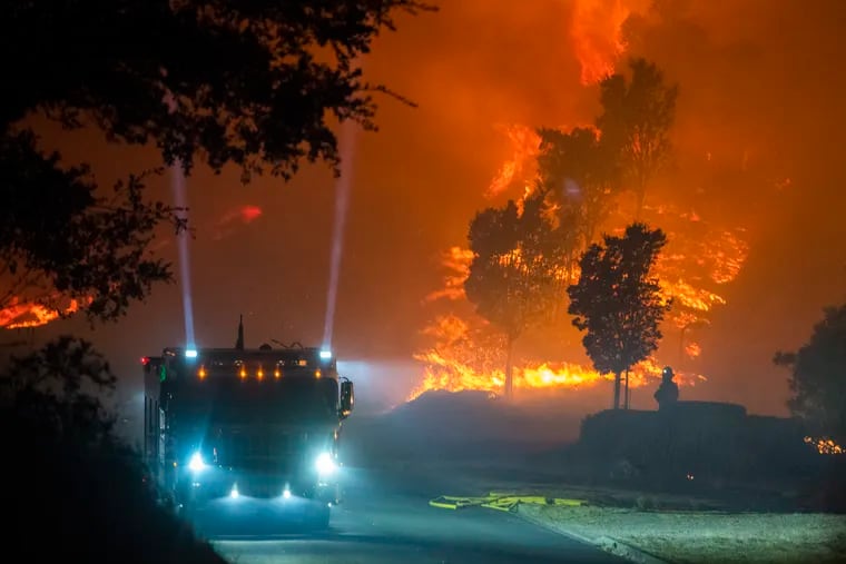 The Kincade Fire burns through Mayacama late Sunday night near Windsor, Calif. Photo for The Washington Post by Stuart W. Palley