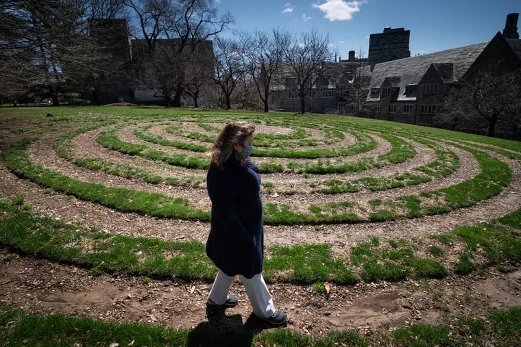 A person takes the opportunity to enjoy the meditative benefits of McBride labyrinth on campus at Bryn Mawr College.