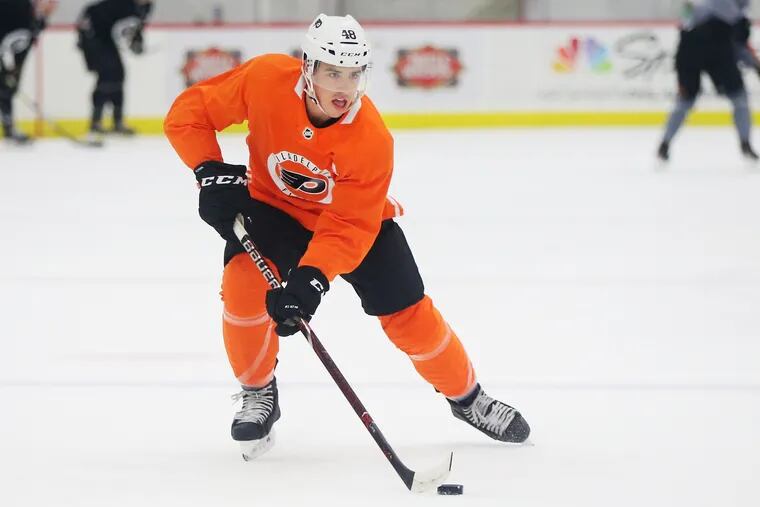 Morgan Frost runs a drill during the first day of Flyers rookie camp. He is injured and will not play in Monday's exhibition against the Isles.