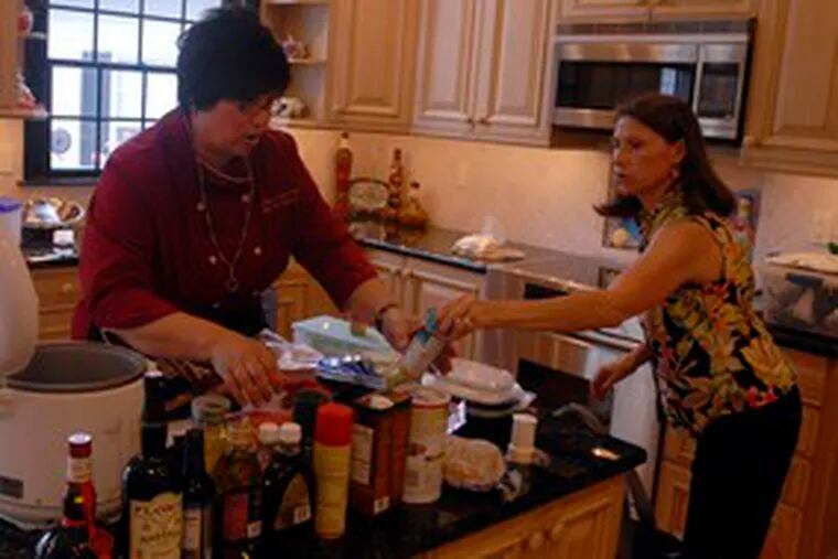 Personal chef Karen Docimo gets help with the groceries from longtime client Nancy MacManus (right). Between osteoarthritis, and allergies, MacManus has limited menu options. She also doesn&#0039;t particularly enjoy cooking. &quot;My son, Kyle, and I were eating out four or five days a week - lunch and dinner,&quot; she said.