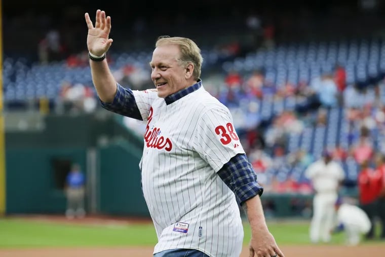Curt Schilling waves during a reunion of the 1993 Phillies in June 2018 in Philadelphia.