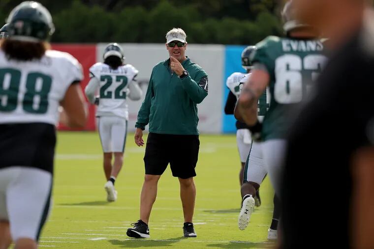 Eagles' head coach Doug Pederson watches during the Philadelphia Eagles training camp at the NovaCare complex in Philadelphia, PA on July 31, 2018. DAVID MAIALETTI / Staff Photographer