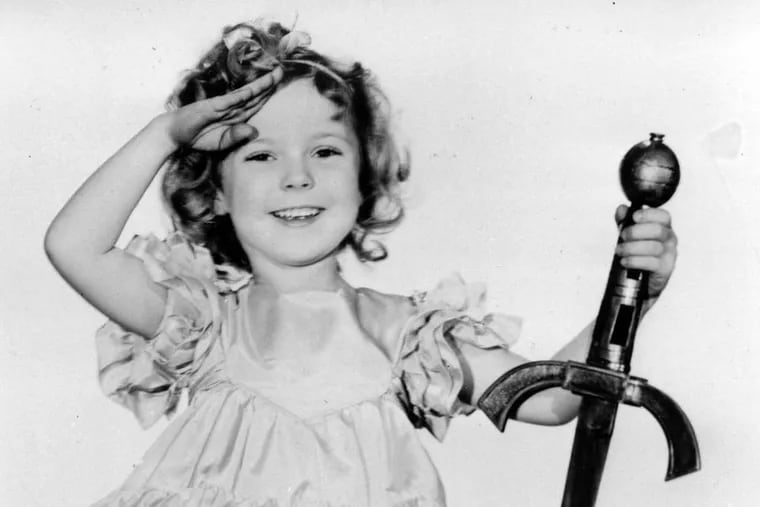 FILE - In this 1933 file photo, child actress Shirley Temple is seen in her role as "Little Miss Marker." Shirley Temple, the curly-haired child star who put smiles on the faces of Depression-era moviegoers, has died. She was 85. Publicist Cheryl Kagan says Temple, known in private life as Shirley Temple Black, died Monday night, Feb. 10, 2014, surrounded by family at her home near San Francisco. (AP Photo/File)