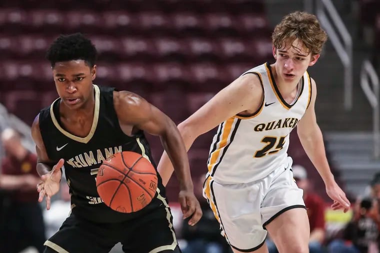 Neumann Goretti Robert Wright  drives past Quaker Valley Dan Bartels during the 4th quarter of the PIAA 4A District VII Championship at the The Giant Center in Hershey, Thursday, March 24, 2022. Neumann Goretti beats Quaker Valley 93-68 for the Championship.