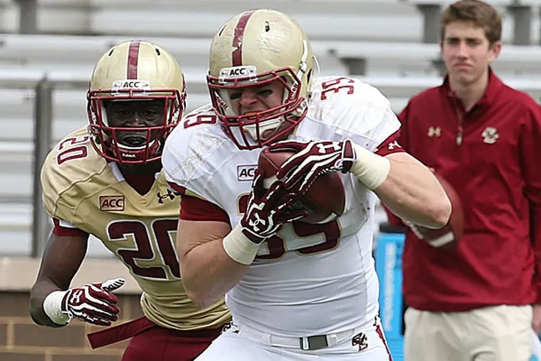 Sean Burke (with the ball) starred at linebacker at La Salle, then earned a scholarship with Boston College after walking on last season.