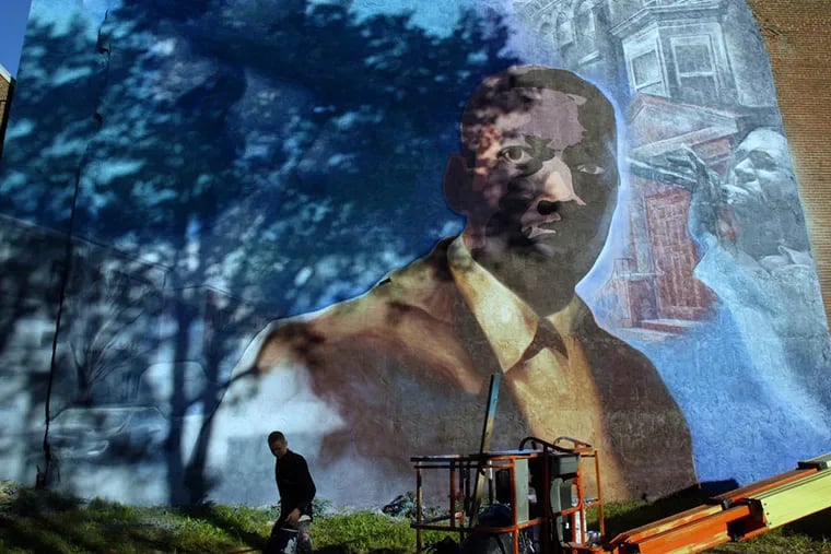 Artist John Lewis created the John Coltrane mural in 2002. (YONG KIM / STAFF PHOTOGRAPHER)