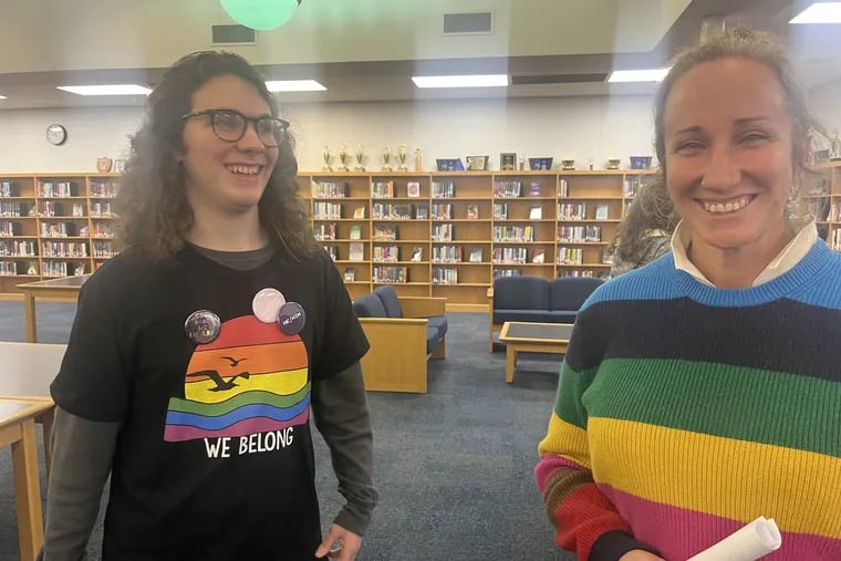 Jakob Pender, left, a 2022 graduate of Ocean City High School and physics student at Rutgers, and Rev. Cricket Denton, a parent and local pastor, following the Jan. 4, 2023 meeting of the Ocean City Board of Education. Both read a letter to the Dr. Matthew Friedman, superintendent, advocating for LGBTQ+ rights in the district.