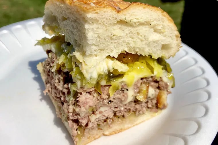 A sample size of the Pickle Monster burger from Lucky's Last Chance, which won first place in the judge's choice category and third place in the people's choice category.