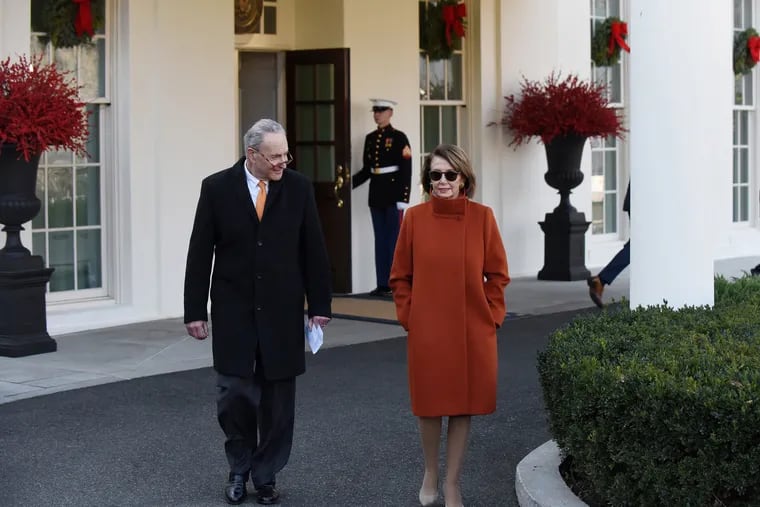 Nancy Pelosi exiting her meeting with President Trump in this much-talked-about Max Mara coat.