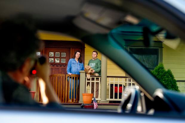 South Jersey photographer’s drive-by ‘porchraits’ capture neighbors self-isolating, together, at this strange moment in time