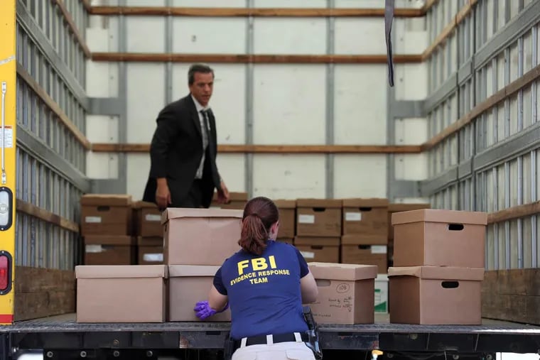 At the Local 98 hall at 17th and Spring Garden Streets, FBI agents removed at least 100 boxes of paperwork and several computer hard drives, loading them into a yellow Penske truck.