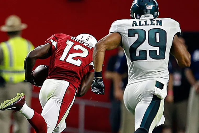 Eagles safety Nate Allen chases Cardinals wide receiver John Brown. (Yong Kim/Staff Photographer)