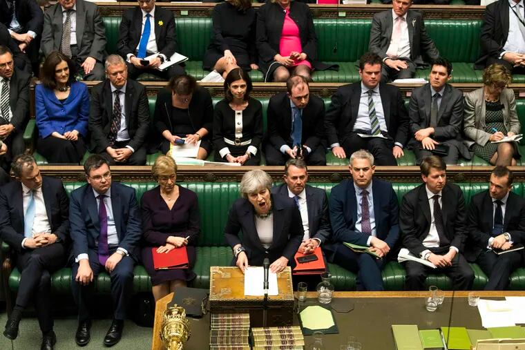 Britain's Prime Minister Theresa May speaks to lawmakers in the House of Commons, London, Wednesday March 13, 2019. In a tentative first step toward ending months of political deadlock, British lawmakers voted Wednesday to block the country from leaving the European Union without a divorce agreement, triggering an attempt to delay that departure, currently due to take place on March 29.