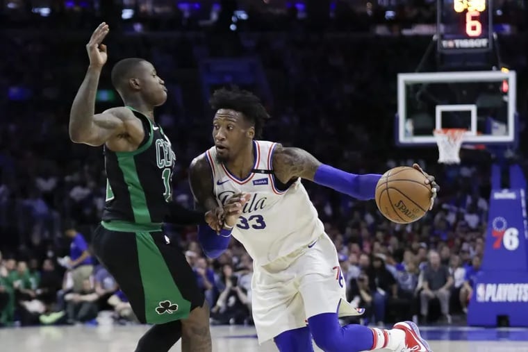Robert Covington trying to dribble past the Celtics’ Terry Rozier during Game 3 of the Eastern Conference semifinals.