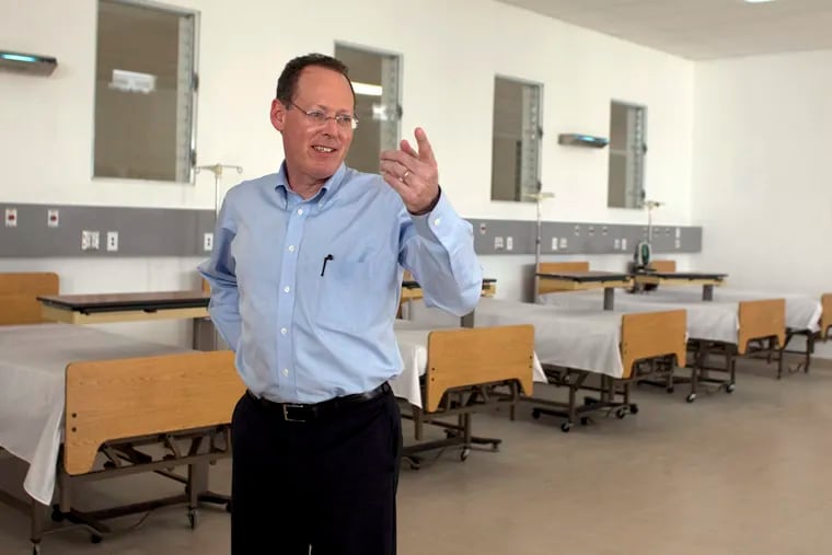 In this picture taken Jan. 10, 2012, Partners in Health's cofounder, Paul Farmer, gestures during the inauguration of national referral and teaching hospital in Mirebalais, 30 miles (48 kilometers) north of Port-au-Prince, Haiti. Farmer, a physician, humanitarian, and author renowned for providing health care to millions of impoverished people, has died. He was 62.