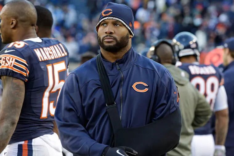 Bears linebacker Lance Briggs walks on the sidelines during an NFL football game against the Detroit Lions in Chicago. Briggs, sidelined the past two months by a shoulder injury, hopes to receive medical clearance to play against the Philadelphia Eagles on Sunday, Dec. 22, 2013. (Nam Y. Huh/AP)