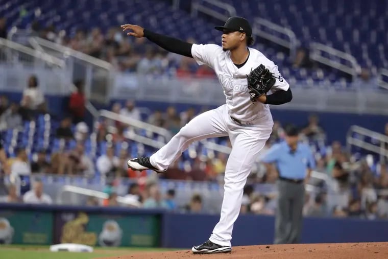 Miami Marlins starting pitcher Elieser Hernandez follows through on a delivery during the first inning of a baseball game against the Philadelphia Phillies, Sunday, Aug. 25, 2019, in Miami. (AP Photo/Lynne Sladky)