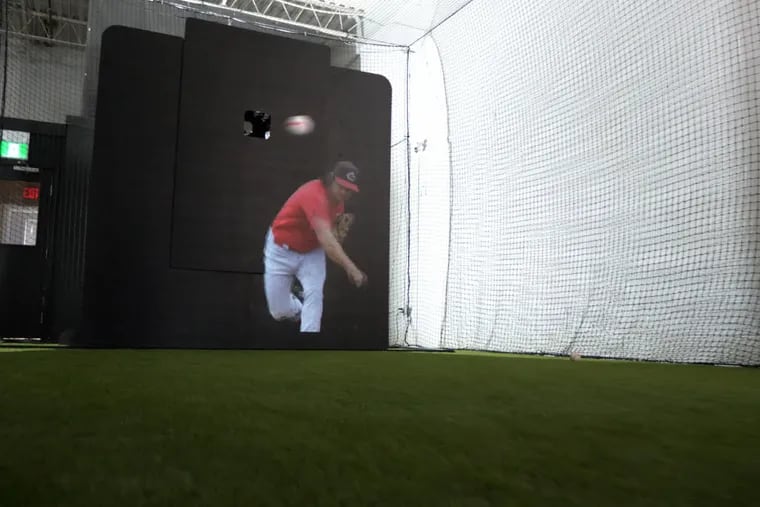 The Trajekt Arc screen rolls horizontally and moves vertically to reach the pitcher’s exact release point, while the pitching machine is calibrated to the speed and spin of each specific pitch.