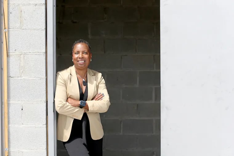 Developer Lorraine Wilson-Drake poses for a portrait at the site of one of her developments on April 21, 2021, in Philadelphia. She is a member of the Collective, a consortium of Black Philadelphia developers that are teaming with a Wall Street emerging markets veteran to raise investment for their real estate projects.