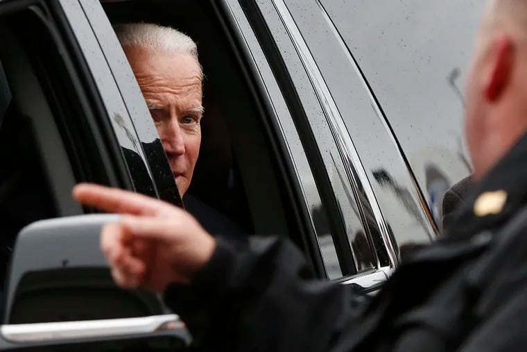 Former vice president Joe Biden looks out the car window as he leaves after speaking at a rally in support of striking Stop & Shop workers in Boston on April 18, 2019.