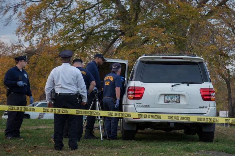 WANDA THOMAS / STAFF PHOTOGRAPHER Shakoor Arline and Lisa Smith were found shot to death Friday in this SUV in Fairmount Park.