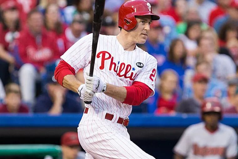 Philadelphia Phillies second baseman Chase Utley (26) hits a double against the Arizona Diamondbacks during the second inning at Citizens Bank Park. (Bill Streicher/USA Today)