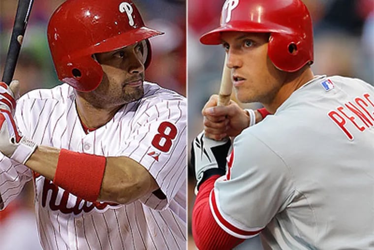 Shane Victorino and Hunter Pence could soon be fighting one another for a playoff spot in the NL West. (AP Photos)