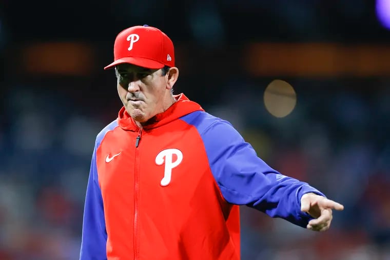Phillies interim manager Rob Thomson points walking back to the Phillies dugout after replacing second baseman Nick Maton against the Los Angeles Angels on Friday, June 3, 2022 in Philadelphia.