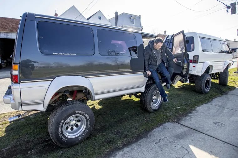 Lenny Bronfman, who is a co-owner in Mendel’s Garage, jumps out of a 1991 Delica that they have refurbished to sell in Philadelphia, it was bought from someone in Japan.